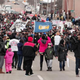 People participate in a national mile-long march to highlight the push for clean water in Flint, Mich., on Feb. 19, 2016.
Bill Pugliano/Getty Images
